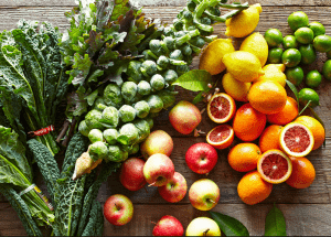 a group of fruits and vegetables on a wood surface Healthy Weight Loss Diets Poulton